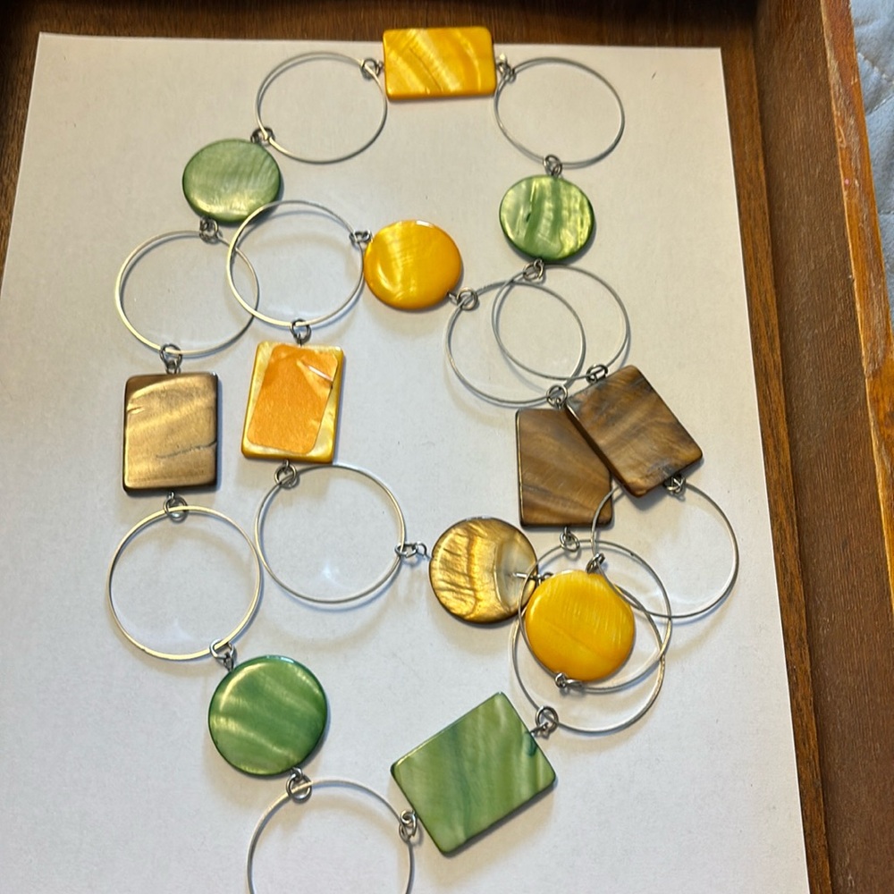 Continuous circle shell necklace 34” green and yellow color